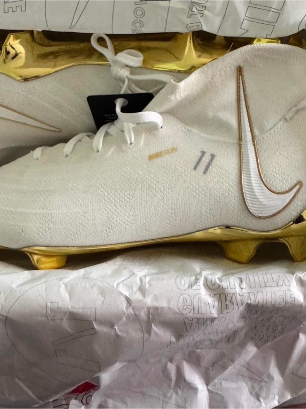 Nike White Soccer Cleats with Gold Outsole